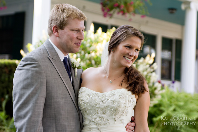 The bride and groom pose for naturally lit portraits after their Whitehall Inn ceremony