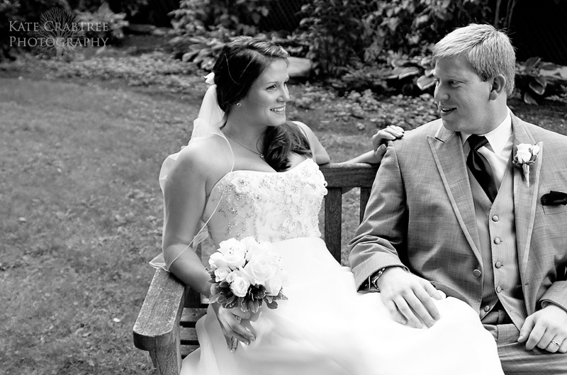 A candid photo of the bride and groom as they relax on the Whitehall Inn property