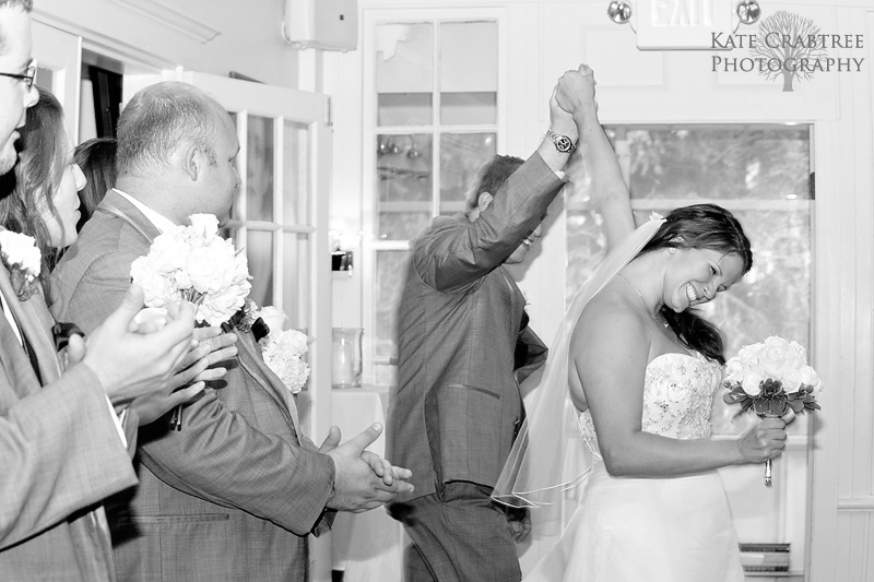 The bride and groom enter into their Whitehall Inn wedding reception with happiness.