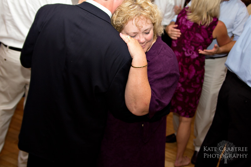 A tired guest collapses into her date at a Whitehall Inn wedding.