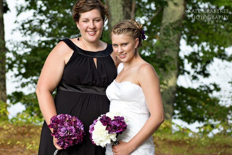 A formal portrait of the bride and her sister during the bride's Lakeview Golf Course wedding in Maine.