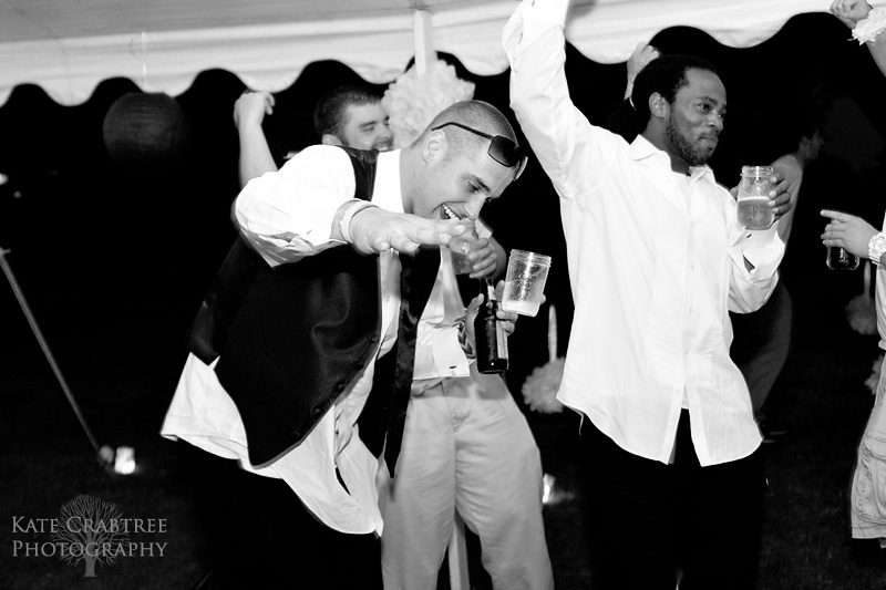 The groomsmen party at the Lakeview Golf Course and show off their dance moves during the wedding reception..