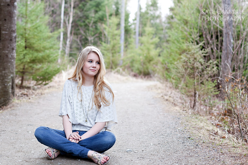 Grace poses for her senior portraits in the Bangor City Forest in Maine