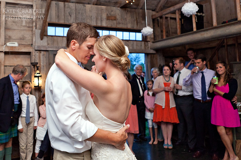 At a midcoast Maine wedding the bride and groom dance.