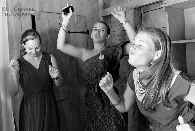 Maine wedding photographer Kate Crabtree captures an energetic dance photo at a North Haven Maine wedding