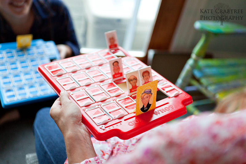 The bride and her bridal party play Guess Who before her Maine wedding