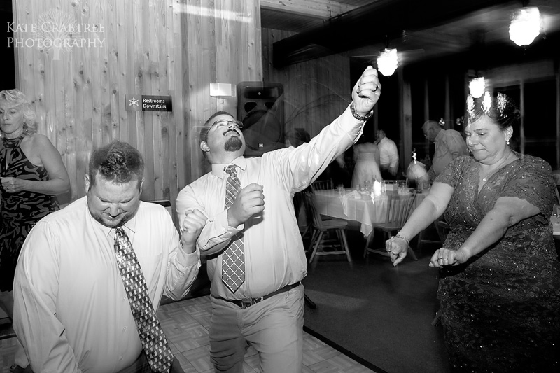 The groom strikes a pose on the dance floor in this photo taken at Sunday river in maine
