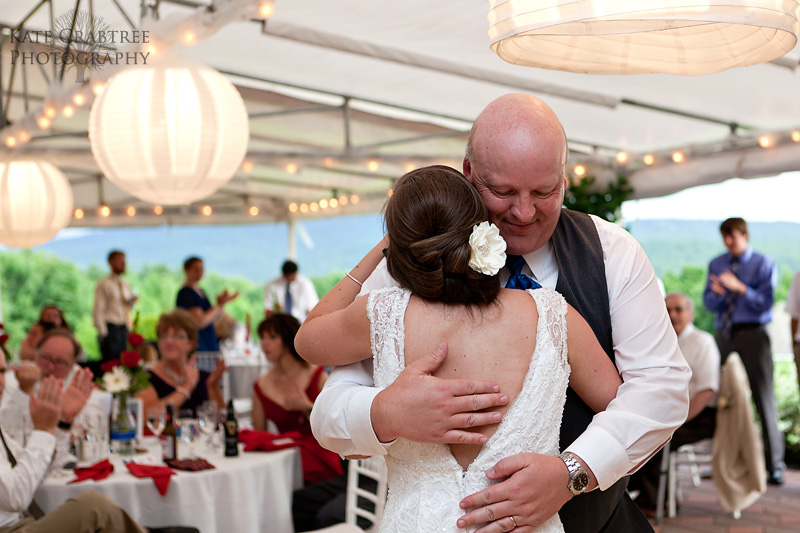 The bride and the father of the bride share their first dance at their wedding at the Lucerne Inn in Maine