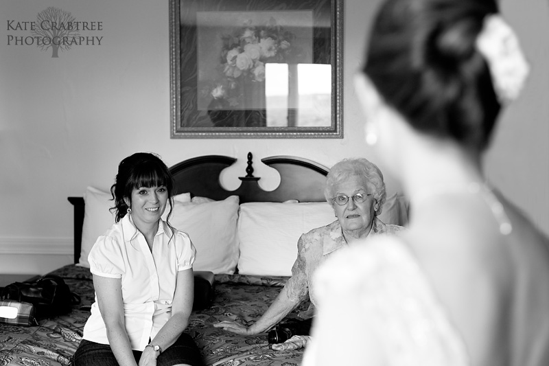 The mother of the groom and the bride's grandmother checks out the bride before her wedding day at Lucerne Inn in Maine