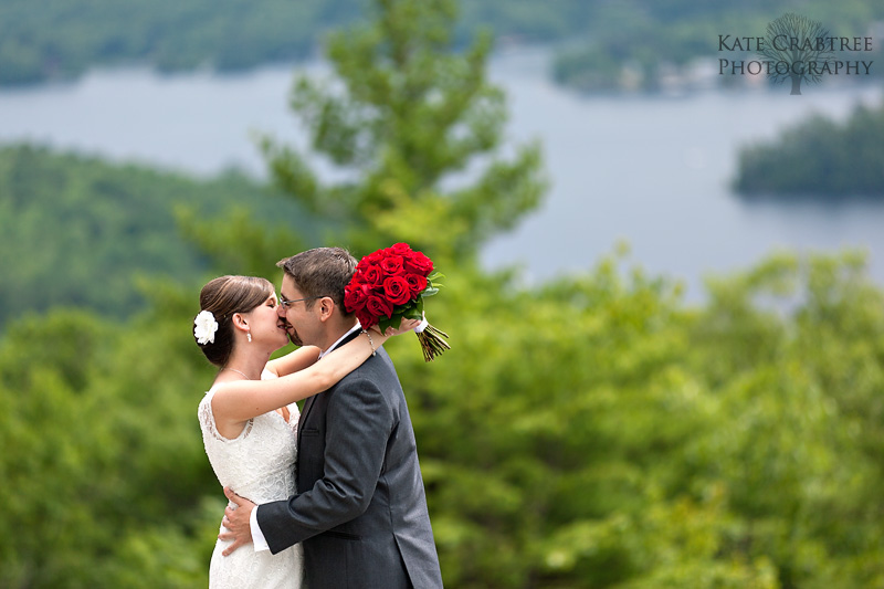 Laura and Mark share a moment on Sunset Rock in Dedham Maine during their wedding