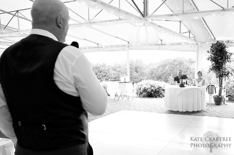 Maine wedding photographer kate crabtree captures the father of the bride giving a toast at a lucerne maine wedding