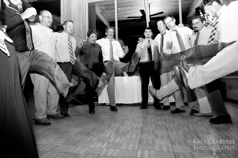 Several guys sing and dance at a wedding reception at Sunday River in western Maine