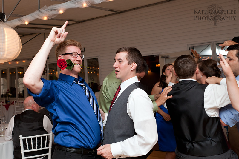 A funny photo of the best man and a friend dancing at the Lucerne inn