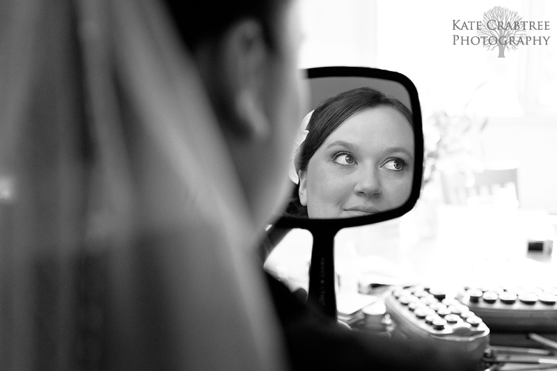 Maine wedding photographer Kate Crabtree took a photo of the bride preparing for her Sunday River wedding