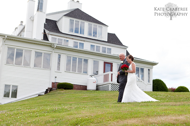 The father of the bride walks the bride down the aisle at this Lucerne Inn wedding