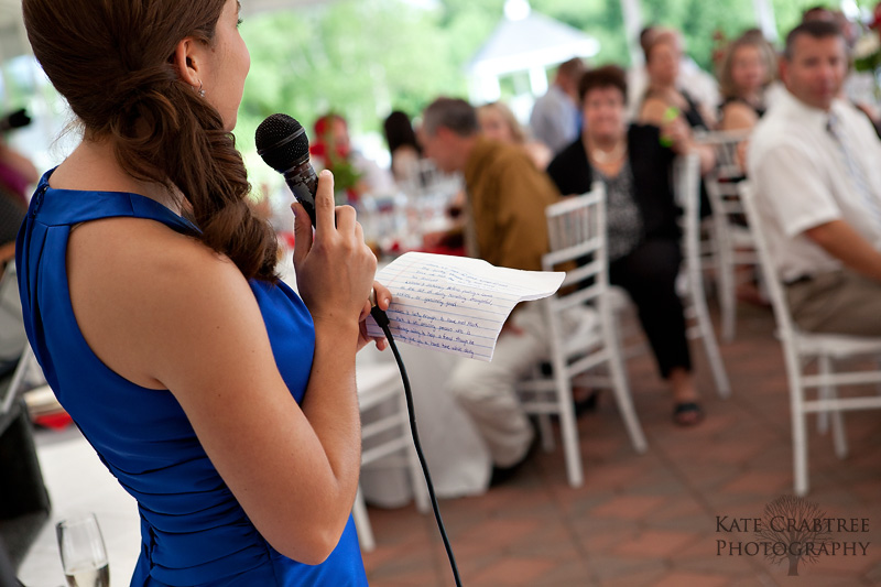 Maine wedding photographer kate crabtree captures the maid of honor giving a toast at a lucerne maine wedding
