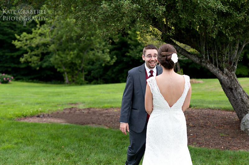 The bride and groom share a first look during their Lucerne Inn wedding in maine