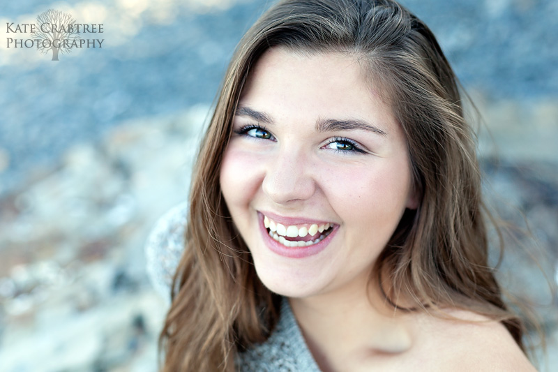 This laughing senior portrait was captured by Kate Crabtree Photography in midcoast Maine
