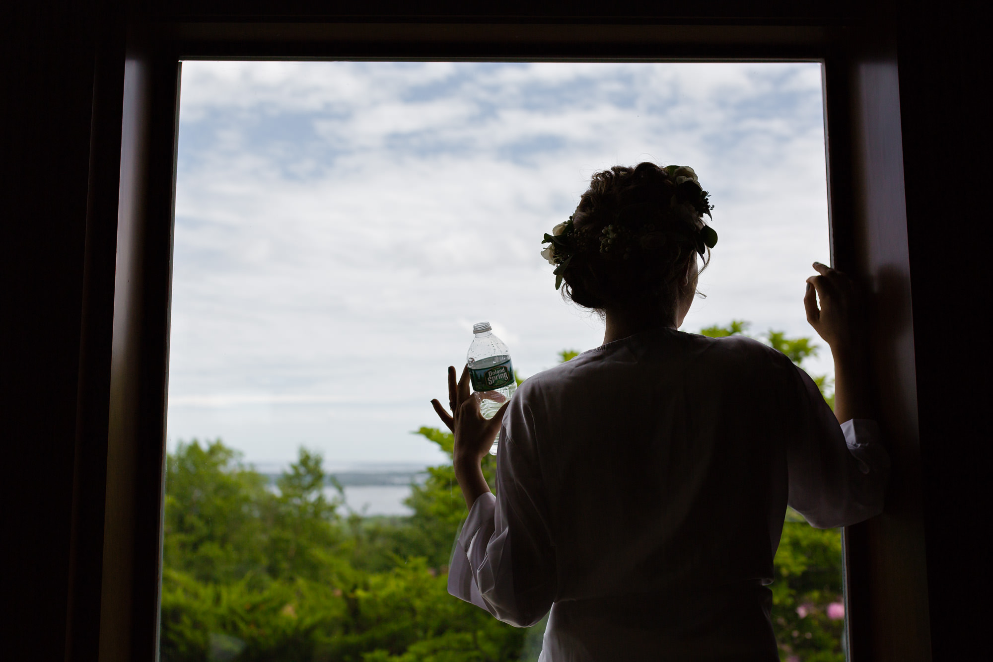 Bride enjoying the beautiful view at a Point Lookout wedding