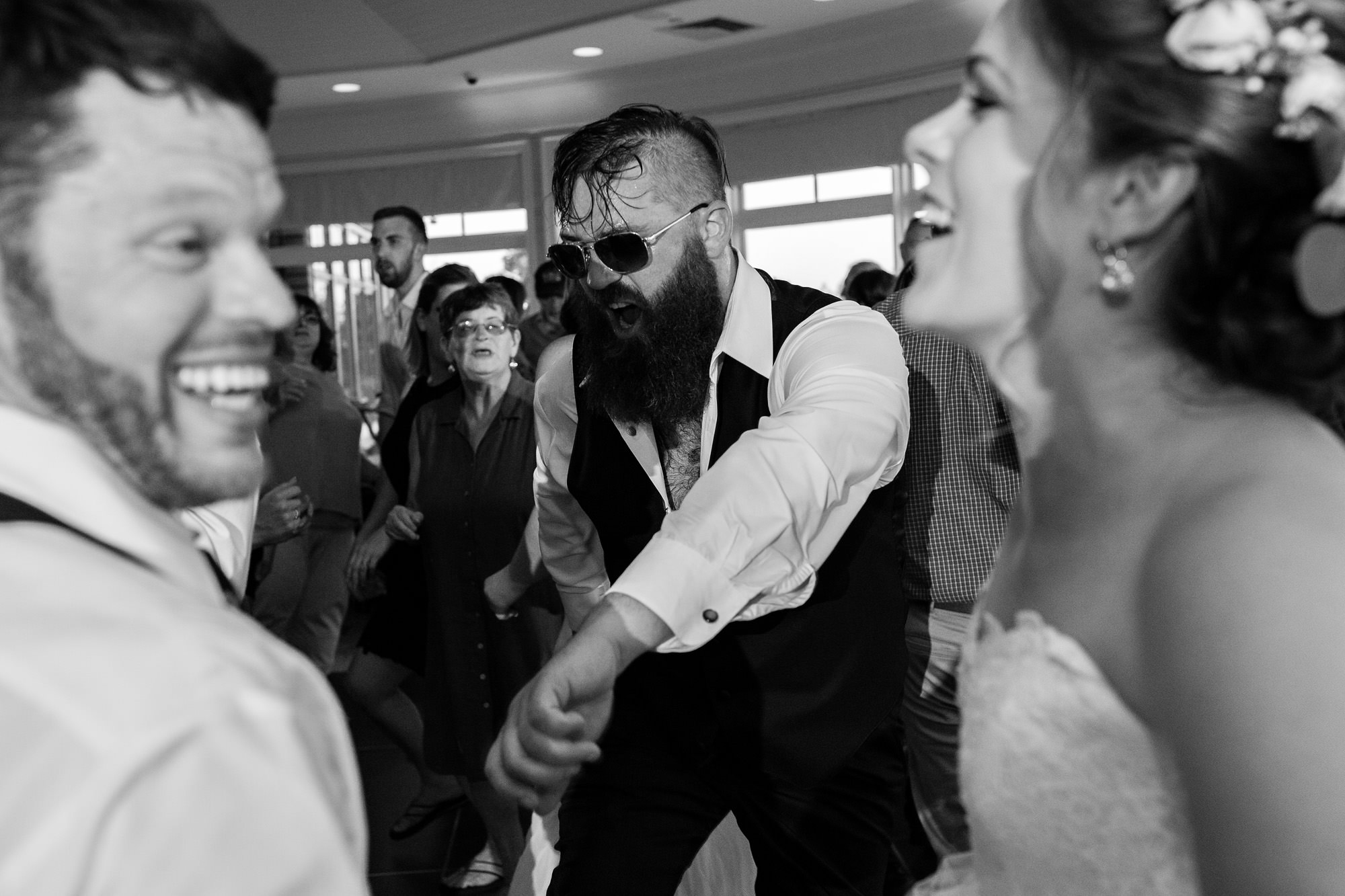 The energetic dance floor at a Point Lookout wedding.