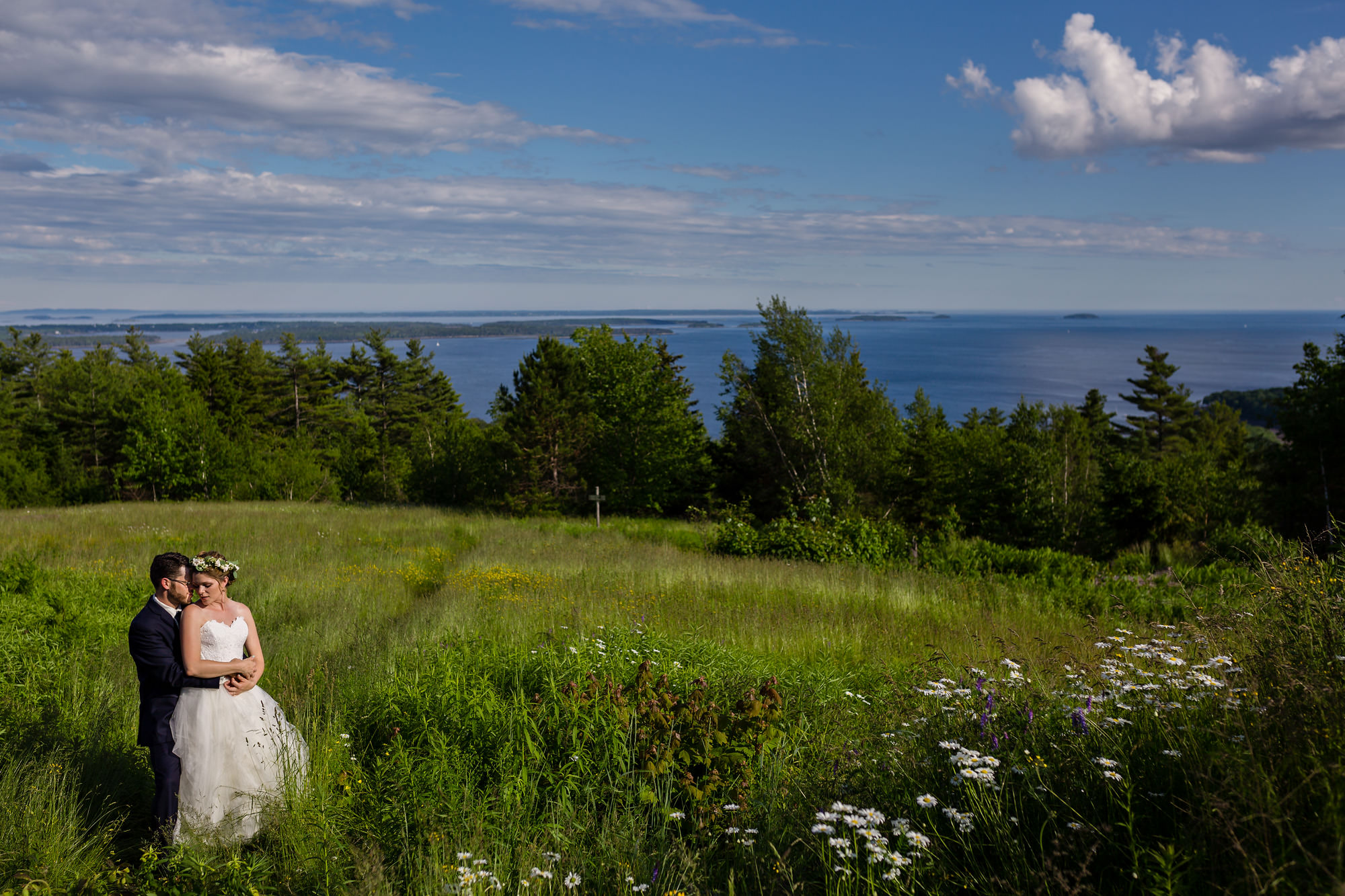 Beautiful wedding portraits taken on the Point Lookout property in Northport, Maine
