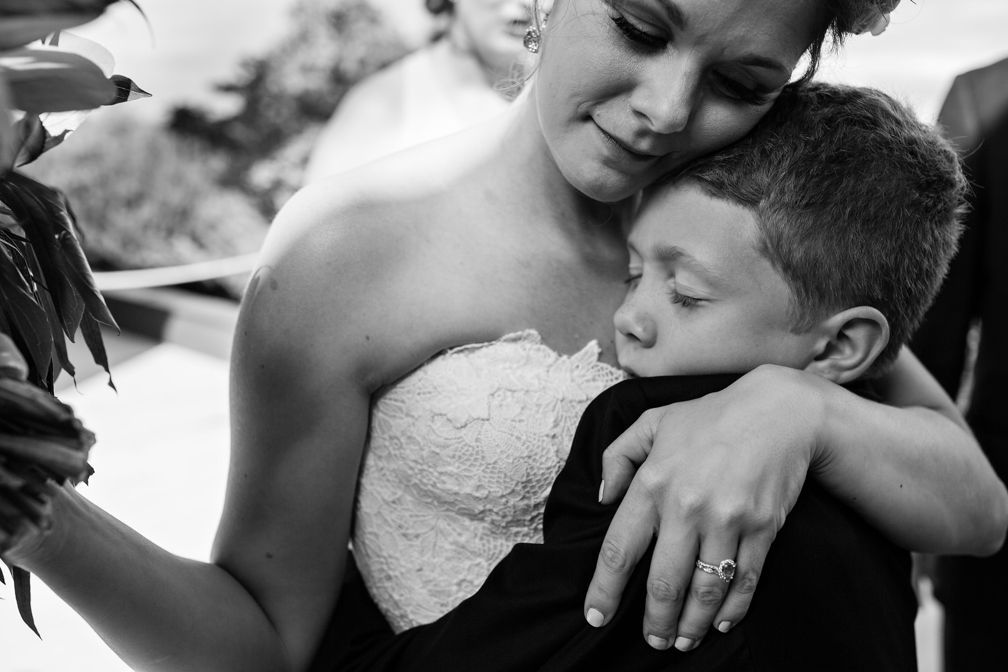An emotional moment with a bride and her son at a Maine wedding.