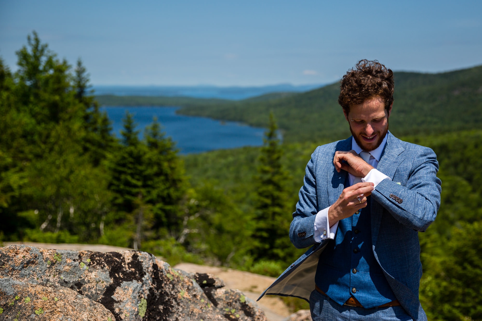 A groom gets ready on South Bubble in Acadia National Park