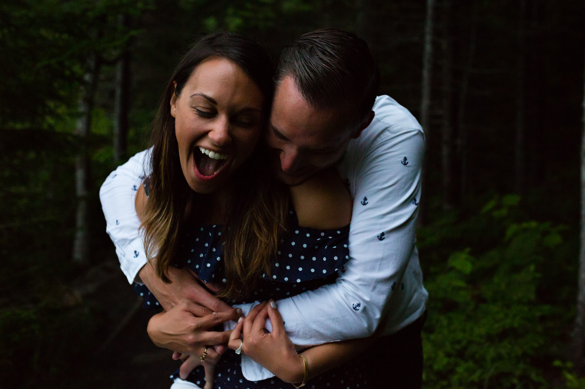An engagement portrait of a couple at Jordan Pond in Acadia