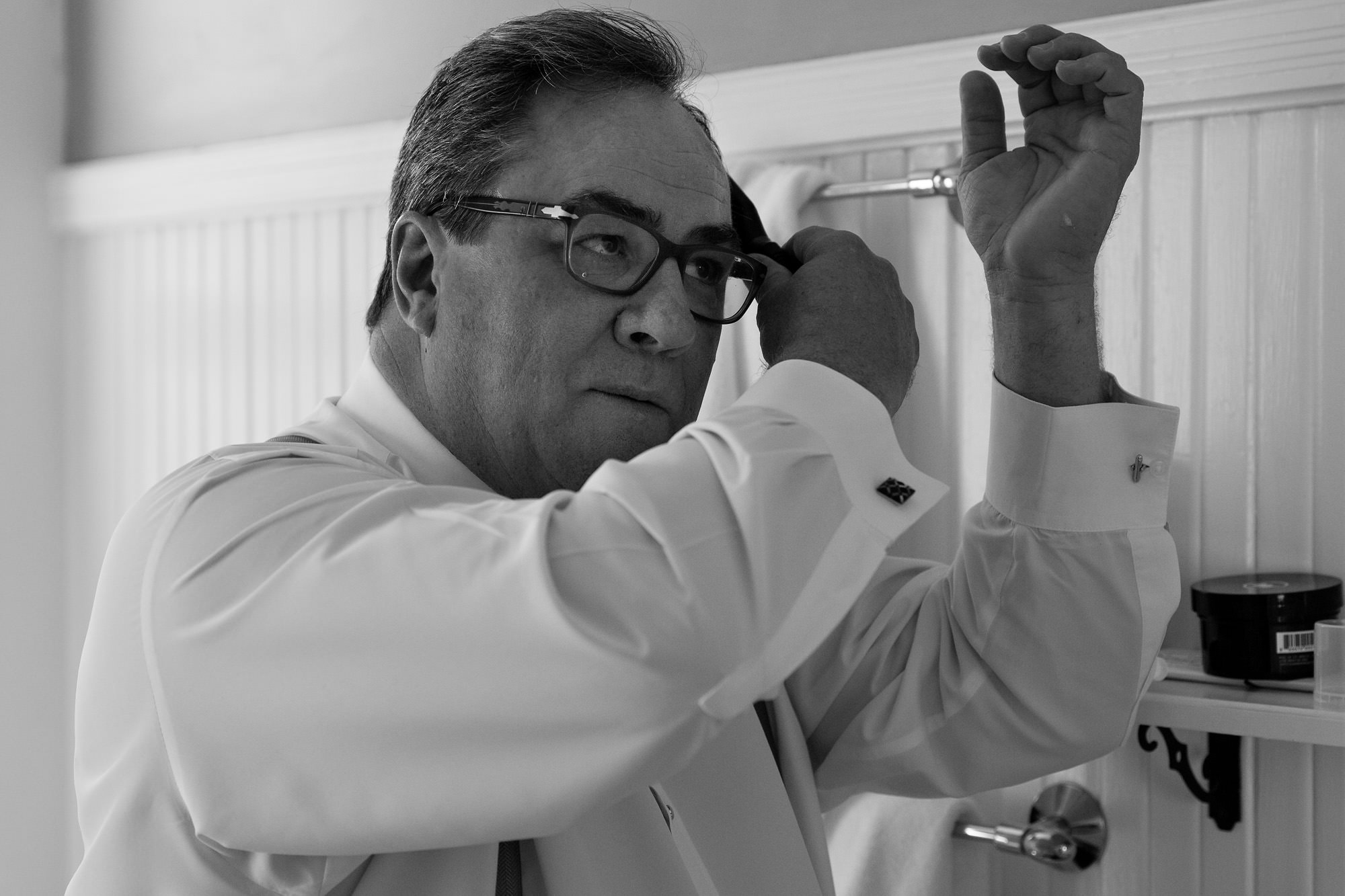 A groom prepares for his wedding in Sugar Hill, New Hampshire