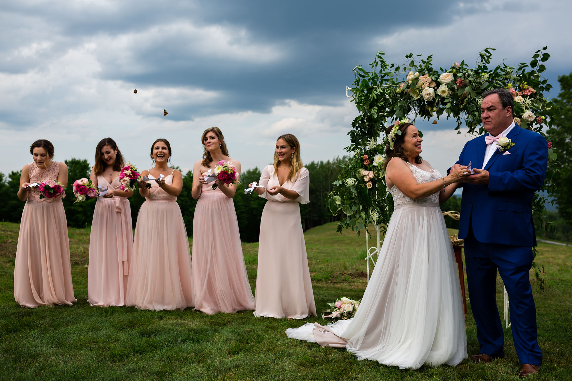 The wedding party released butterflies during their private residence wedding