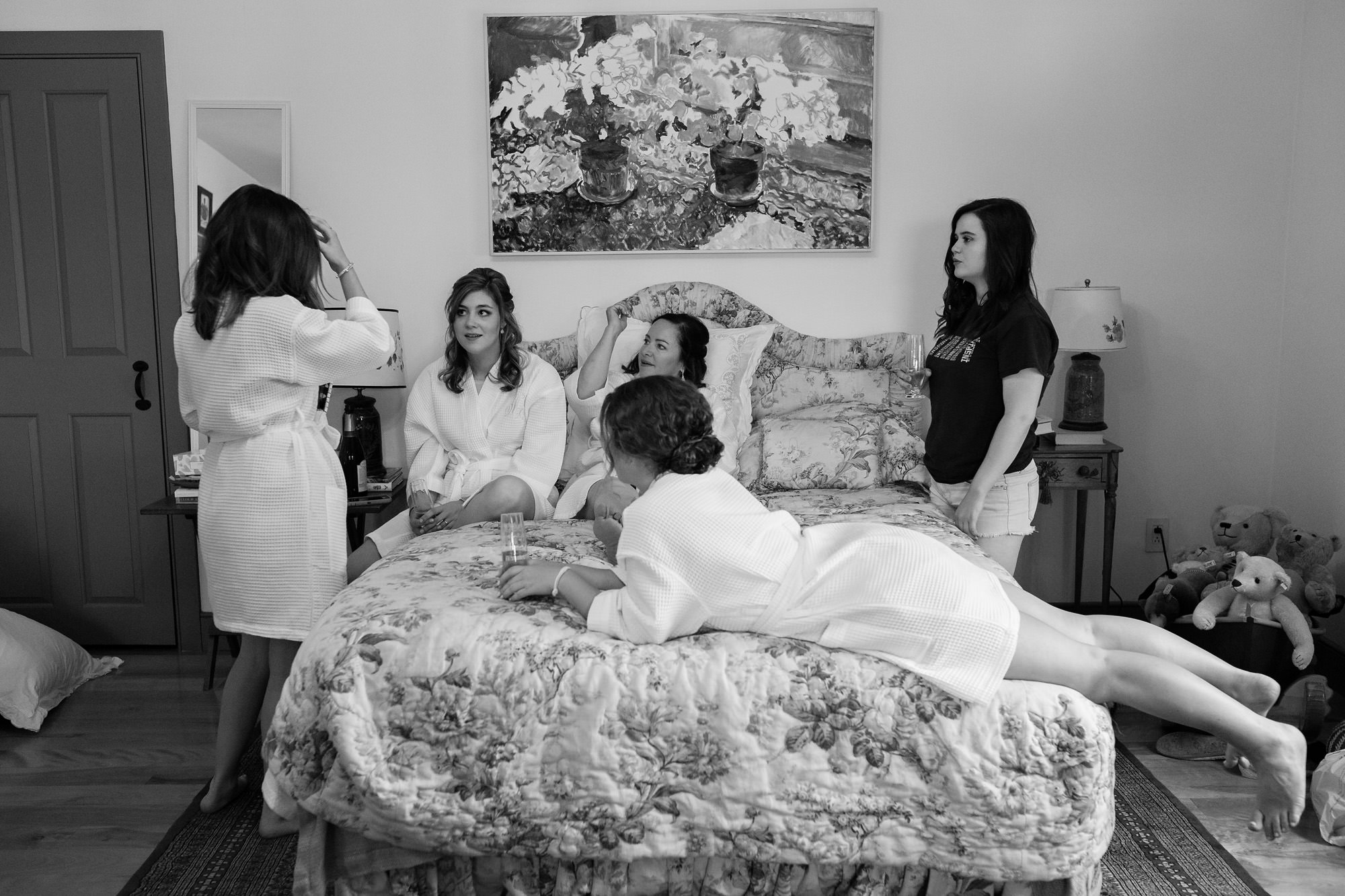 A bride and her bridesmaids get ready at a private residence wedding in Sugar Hill, New Hampshire