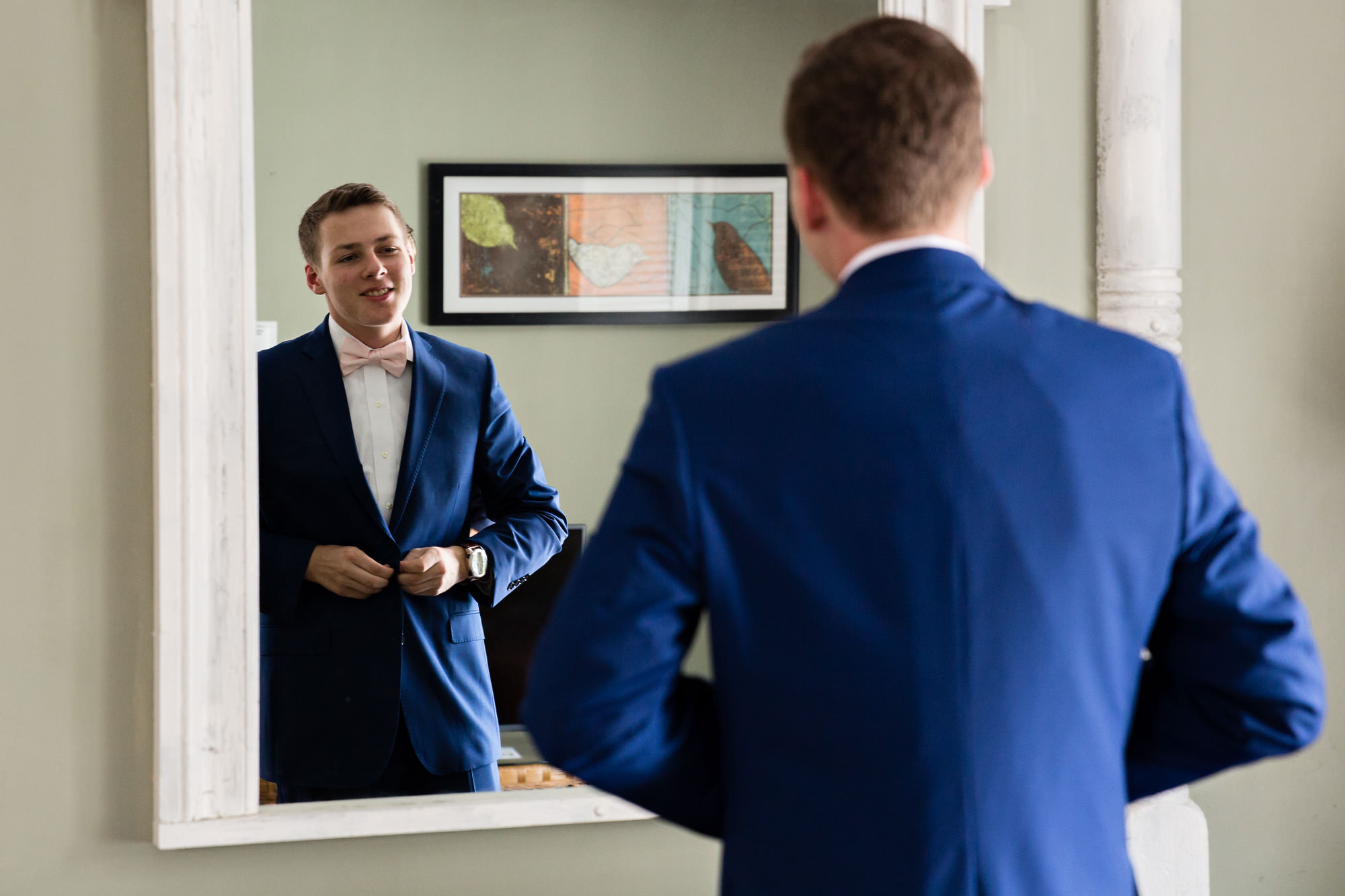 Groomsmen get dressed for a Sugar Hill, New Hampshire wedding