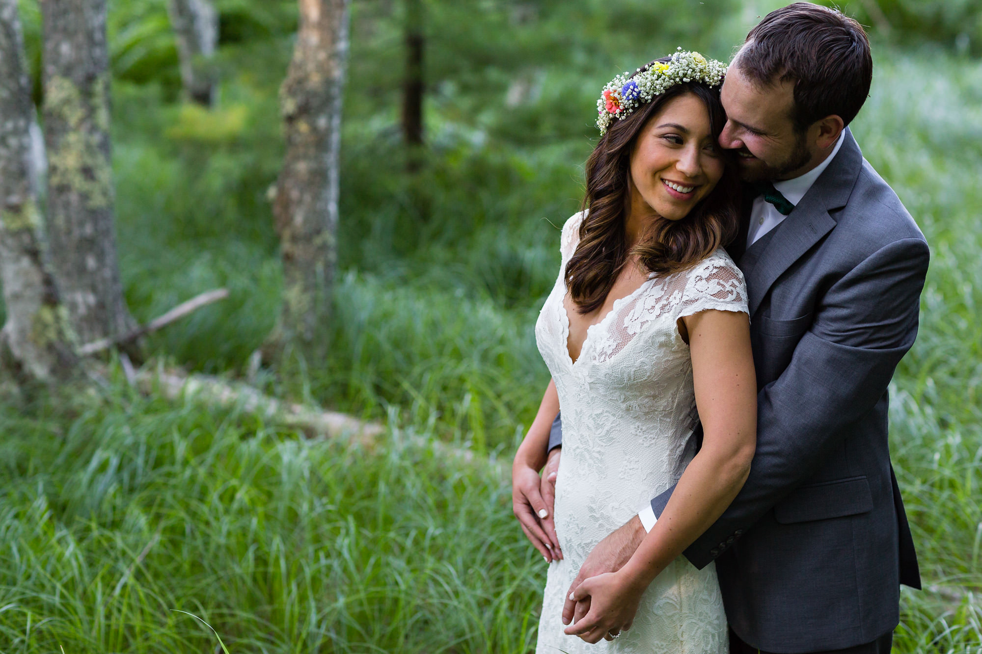 A bride and groom take elopement portraits on the Jessup Path