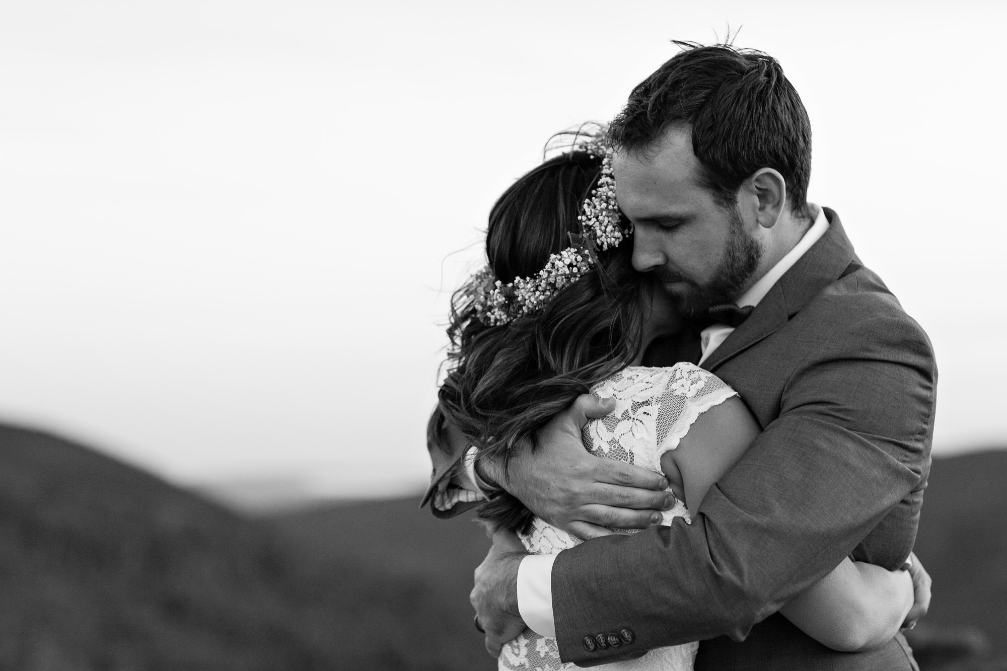 Beautiful elopement photos of a bride and groom on Cadillac Mountain