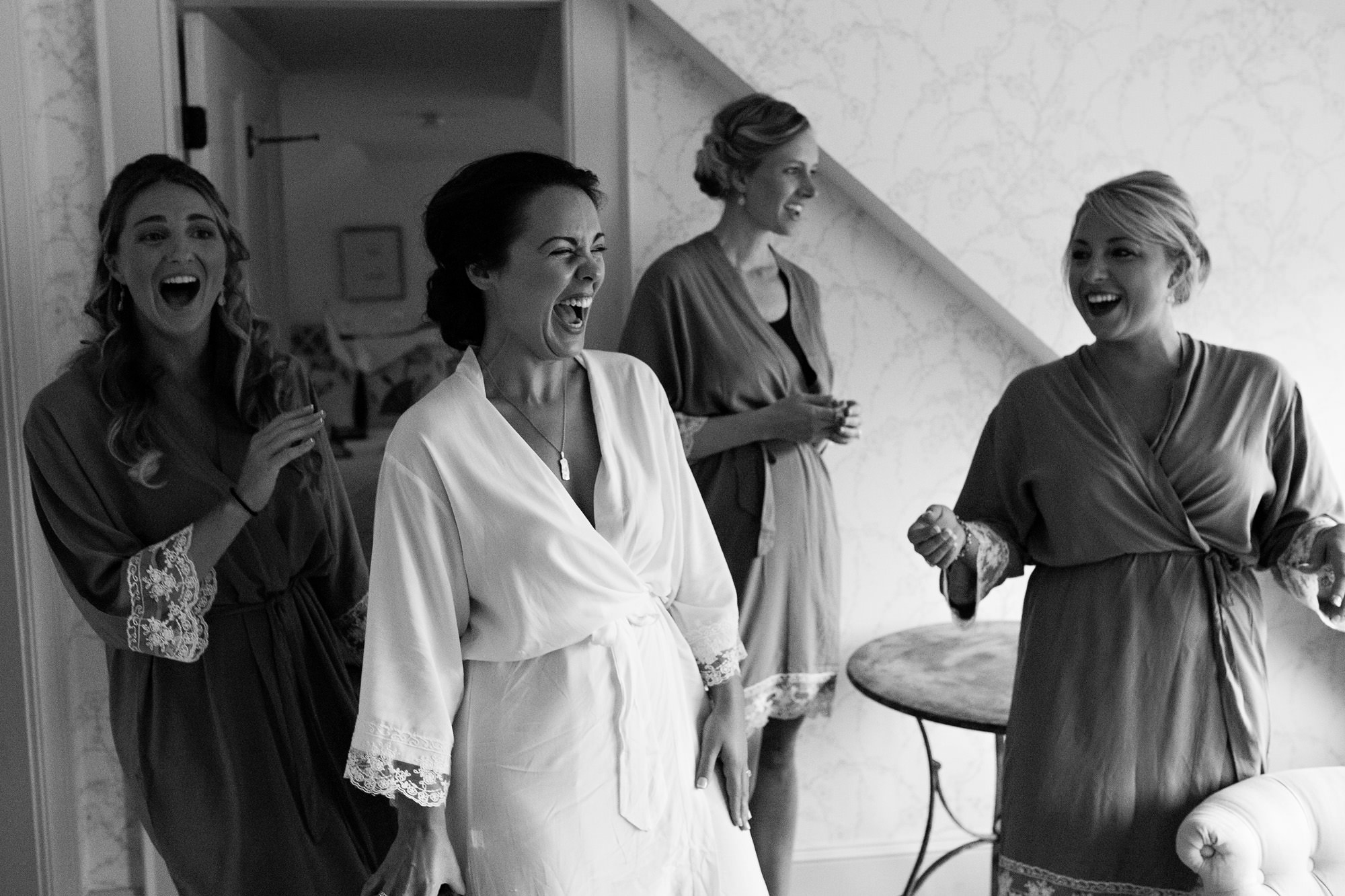 The bride and her bridesmaids get ready at the Barn at Flanagan Farm in Buxton, Maine