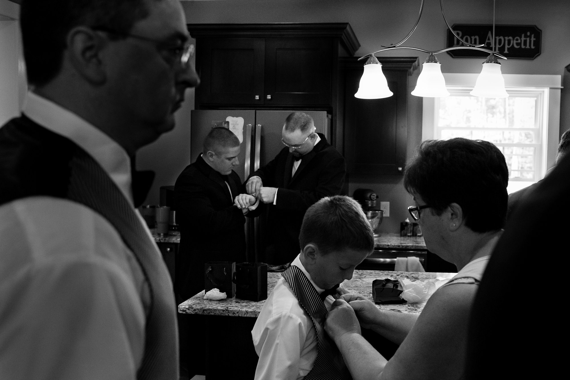A groom prepares for her French's Point wedding in Maine