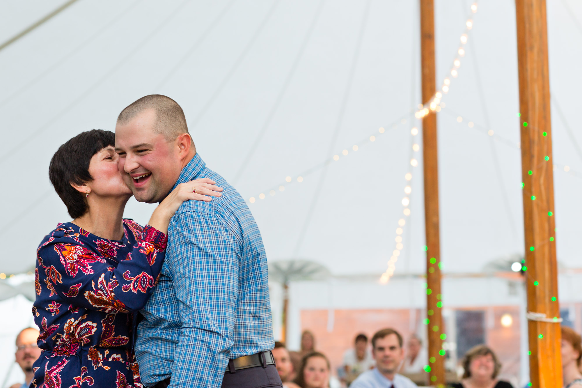 A sweet mother son dance at a wedding at the New England Outdoor Center