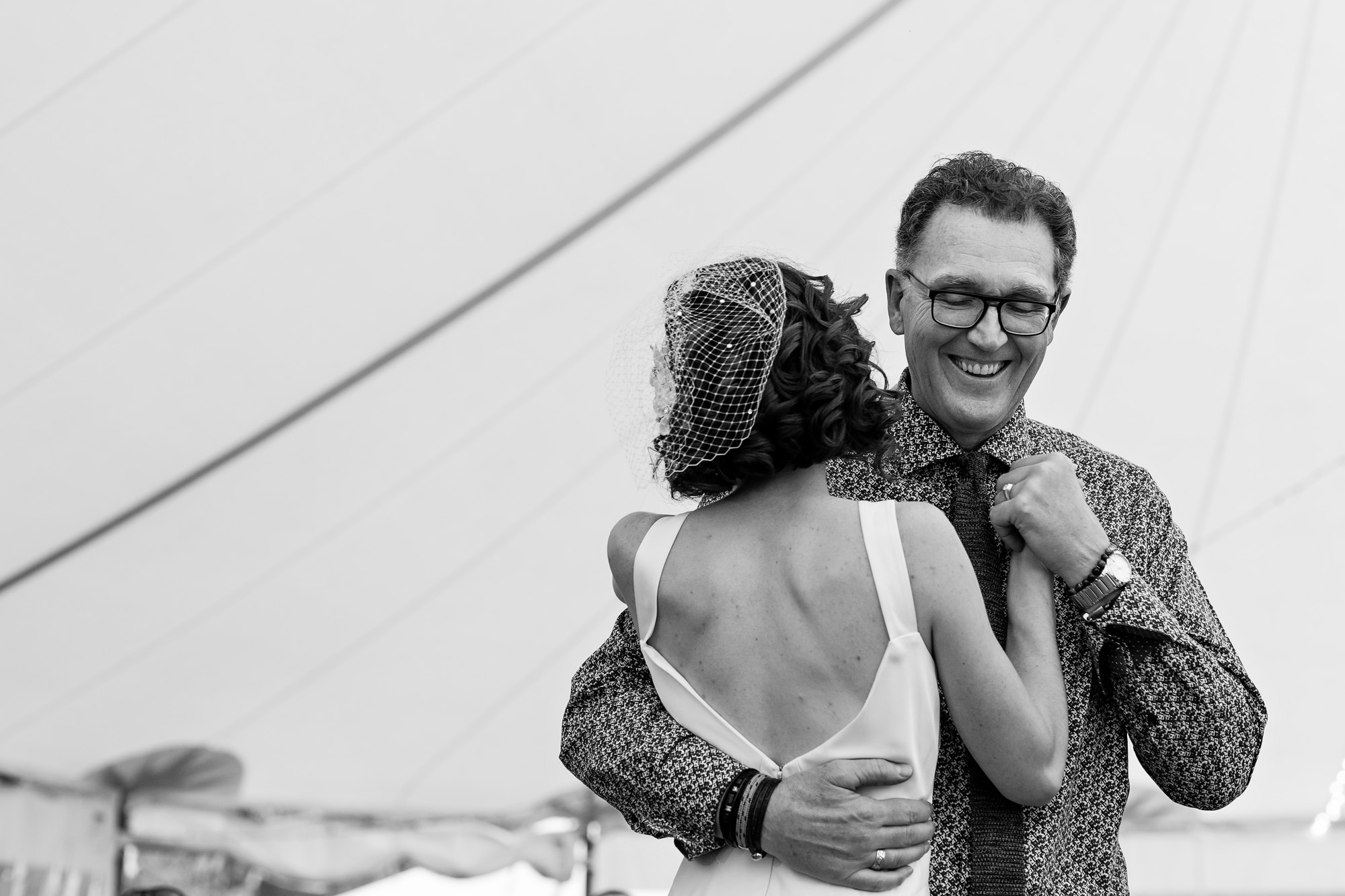 A sweet father daughter dance at a wedding at the New England Outdoor Center