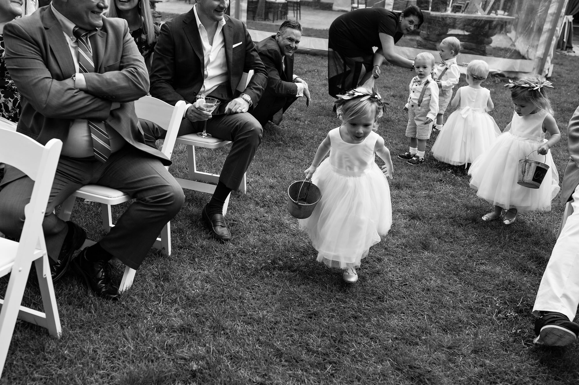 The flower girls/ring bearers struggle at a wedding ceremony in Kennebunkport, Maine