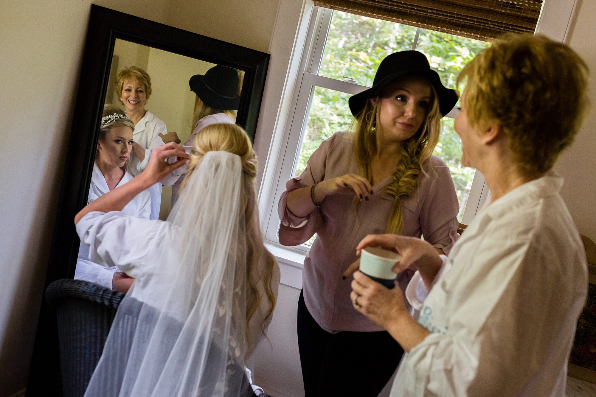 A bride gets ready for her wedding in Kennebunkport, Maine