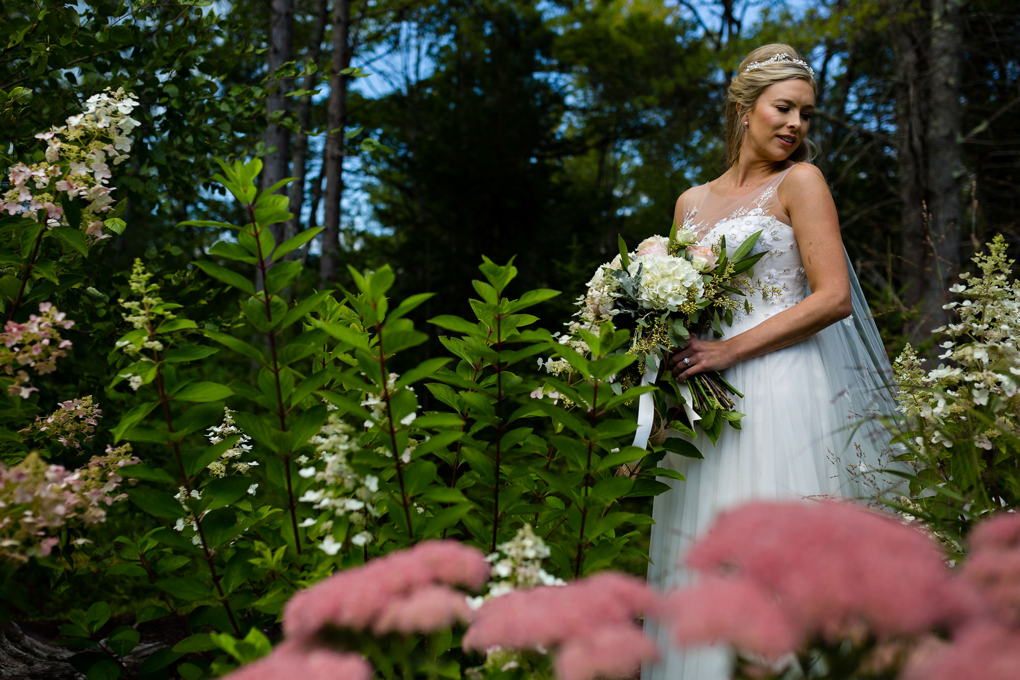 A bridal portrait taken at Hidden Pond in Kennebunkport, Maine