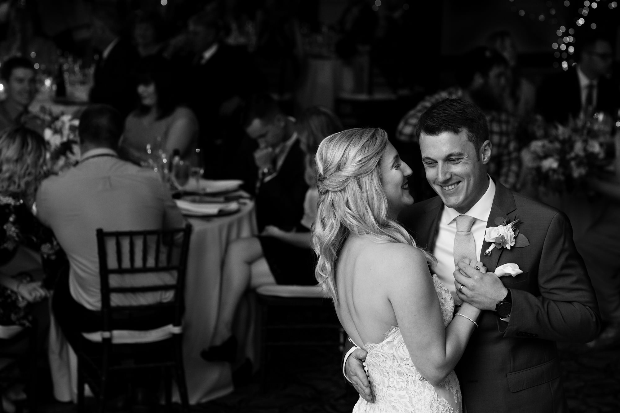 The bride and groom share a romantic first dance in the Bar Harbor Club ballroom.