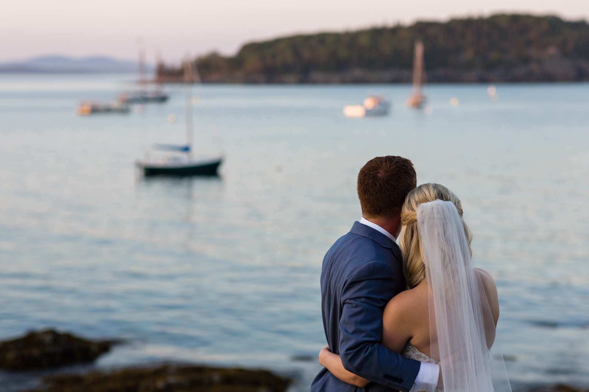 Wedding portraits taken on the shore path in Bar Harbor, Maine