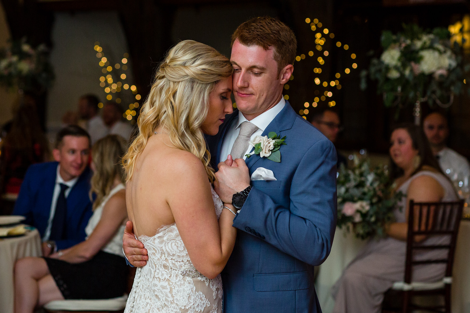 The bride and groom share a romantic first dance in the Bar Harbor Club ballroom.