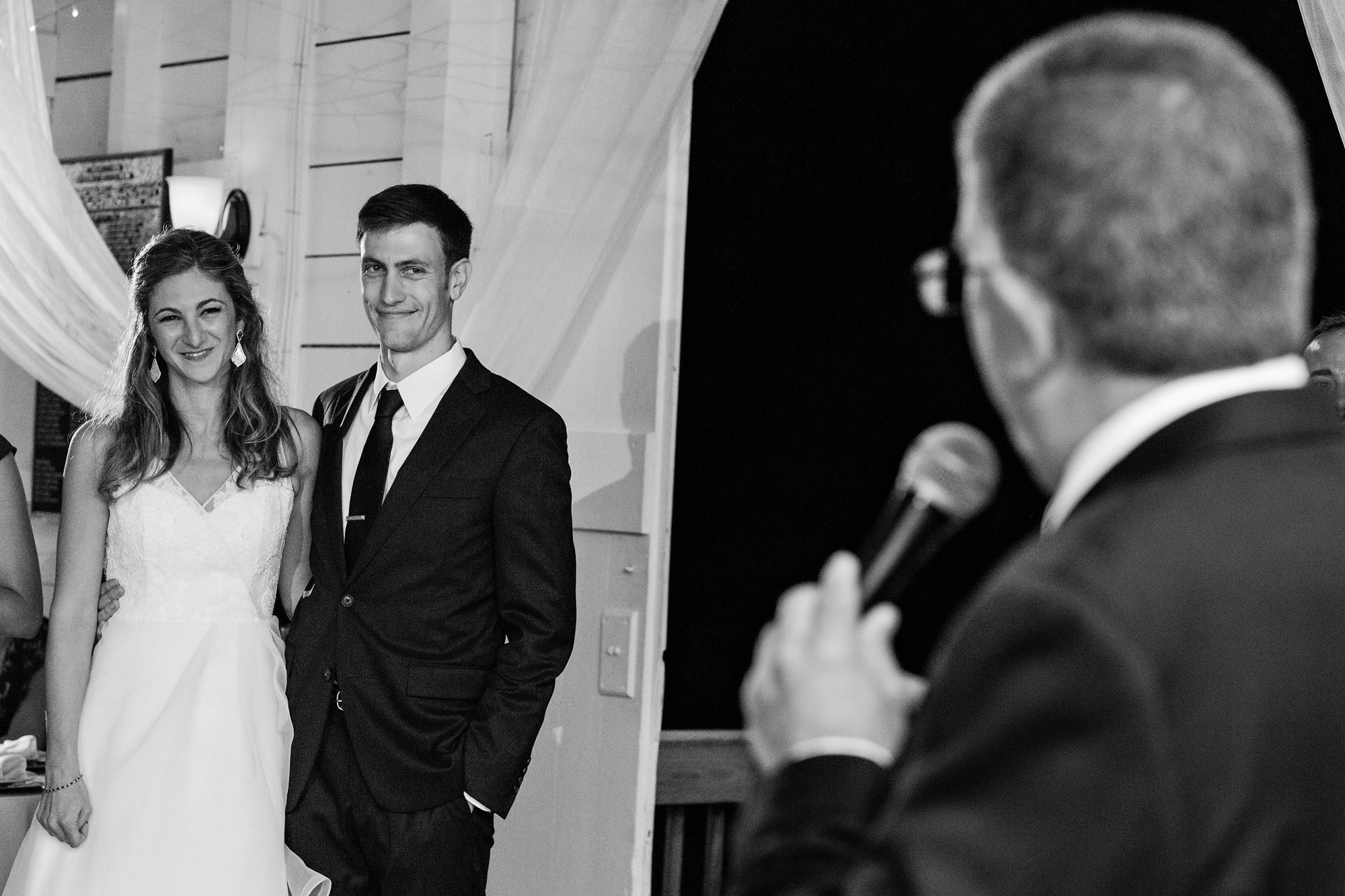 The bride and groom enjoy a toast during a Causeway Club wedding reception