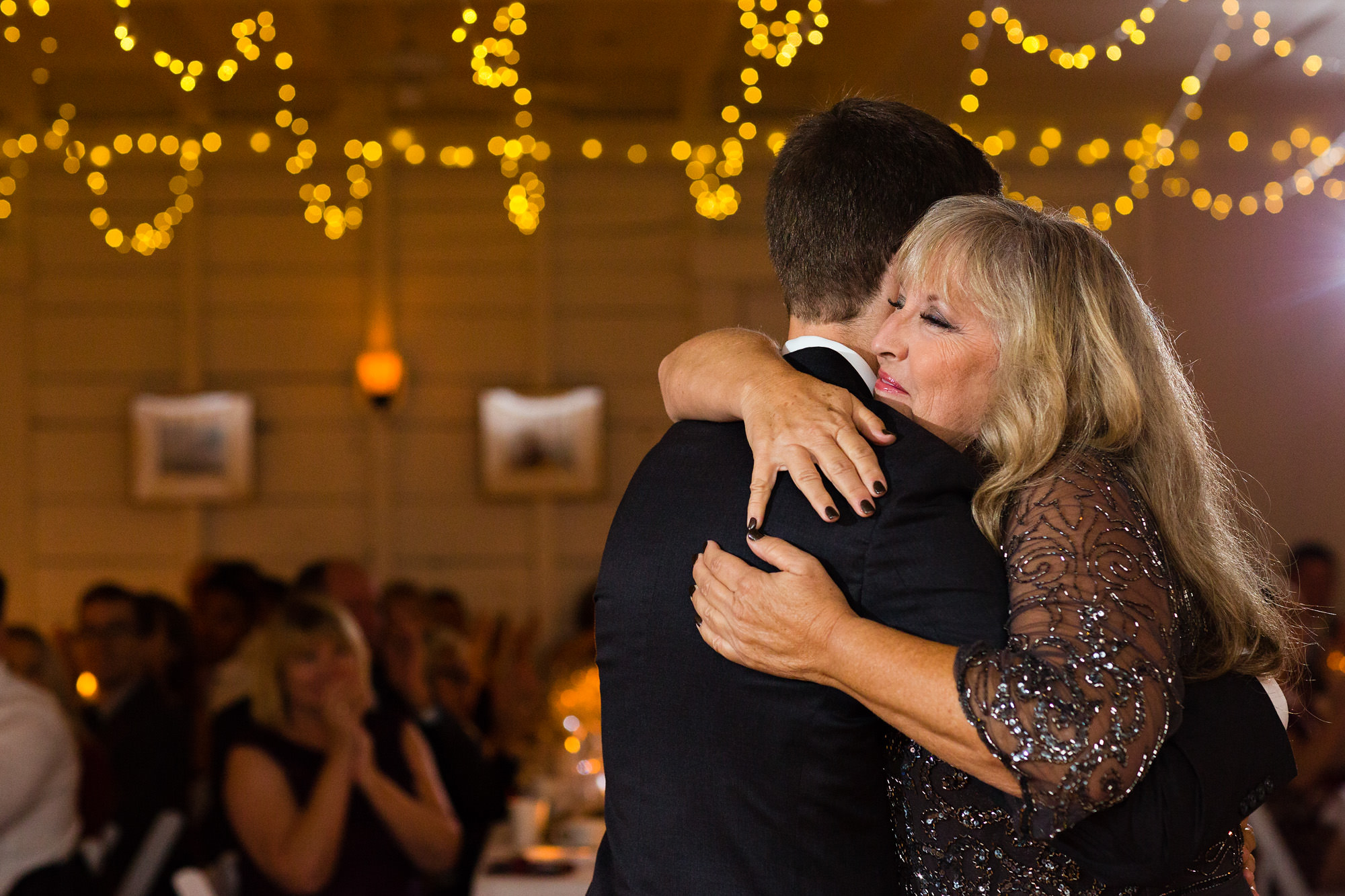 The groom and his mother shares their first dance at their Mount Desert Island wedding
