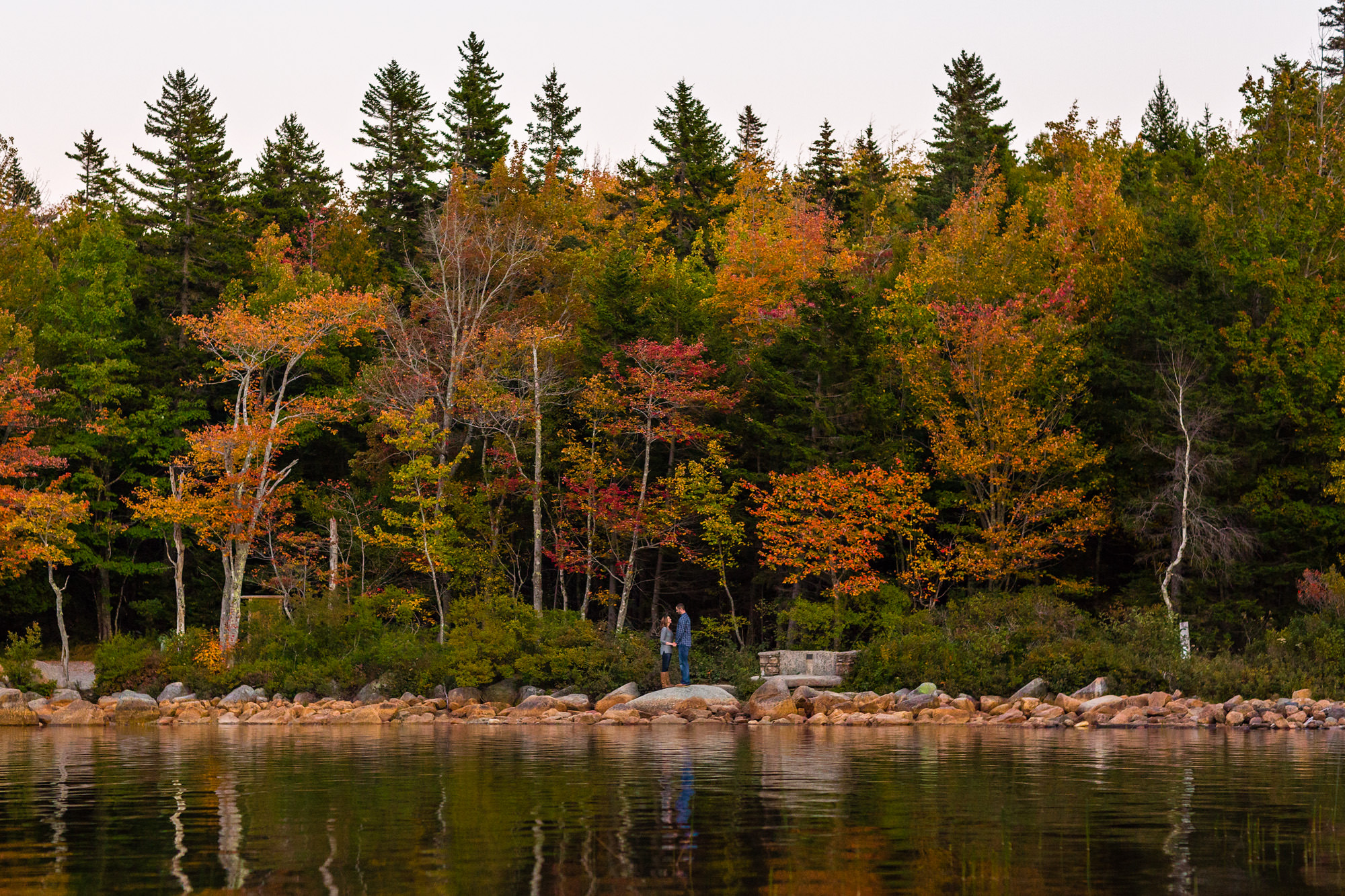 The foliage is spectacular at Jaimie and Cory's engagement session at Jordan Pond in Acadia
