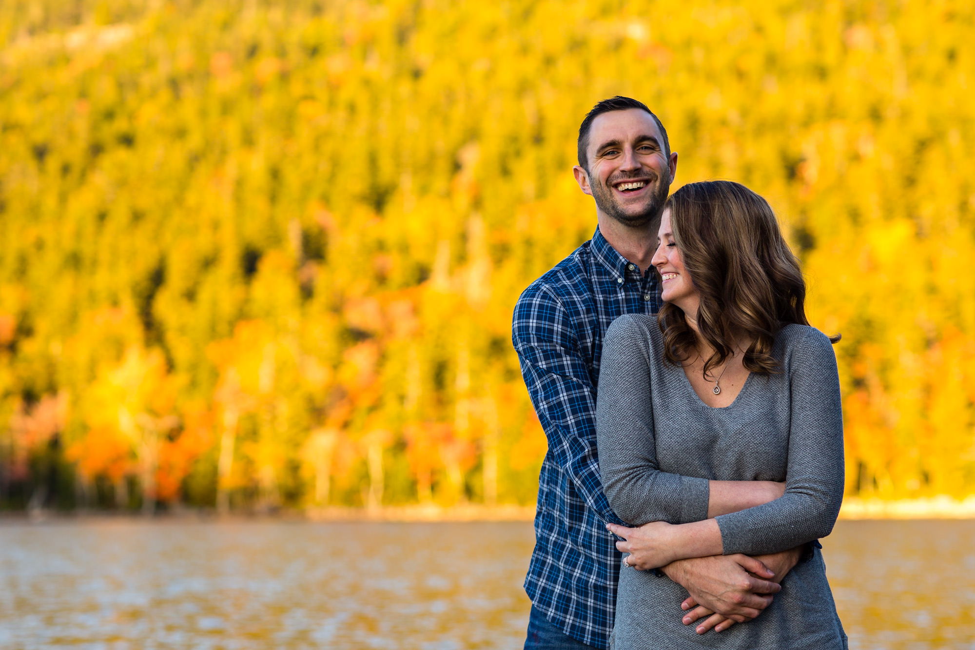 Beautiful fall foliage at Jordan Pond for Jaimie and Cory's engagement session at Jordan Pond
