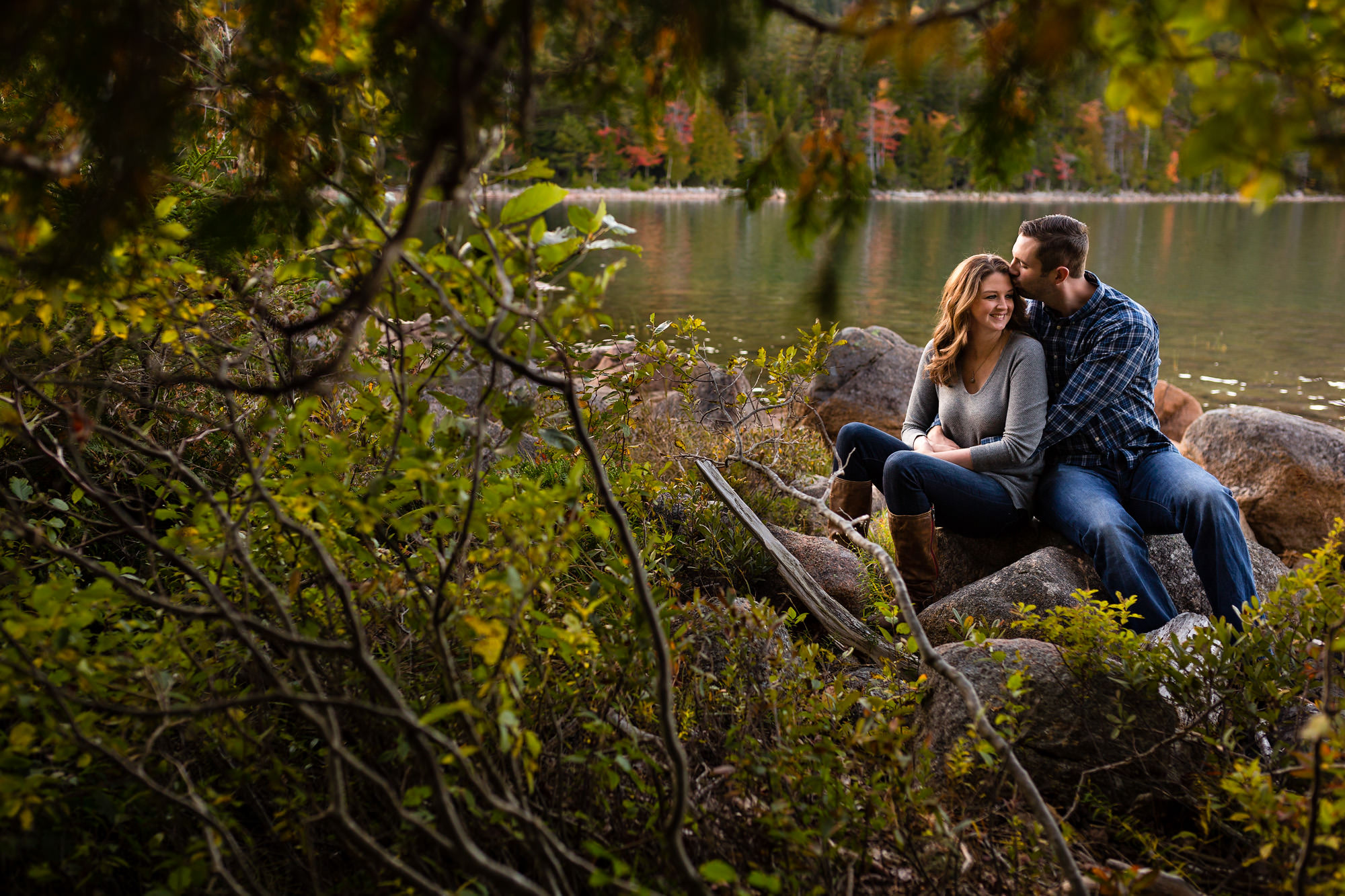 Jaimie and Cory share a beautiful moment at their engagement session at Jordan Pond in Acadia