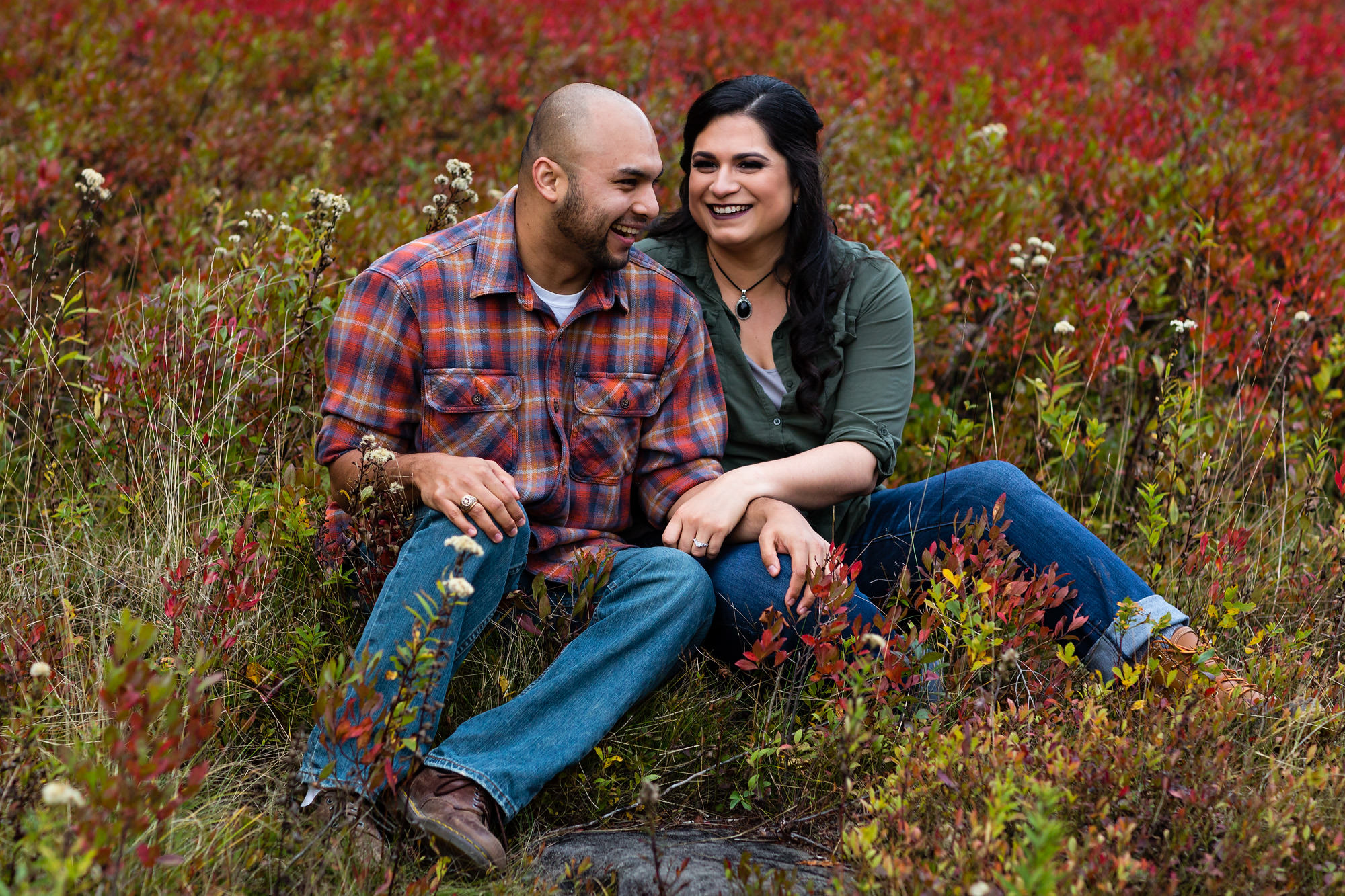 An engagement portrait of Bethany and Hebert at Jordan Pond in Acadia in Maine